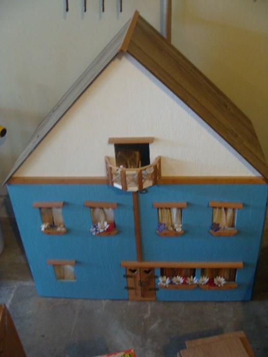Owner custom made this Doll House for his Daughter. It opens from the roof and the front and the back. The Doll House is full of accessories. All the drapes and wallpapers were done by the mother.