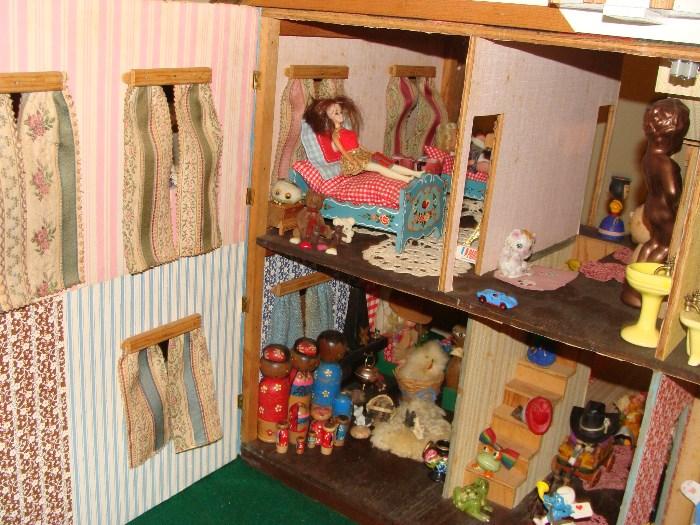 Owner custom made this Doll House for his Daughter. It opens from the roof and the front and the back. The Doll House is full of accessories. All the drapes and wallpapers were done by the mother.