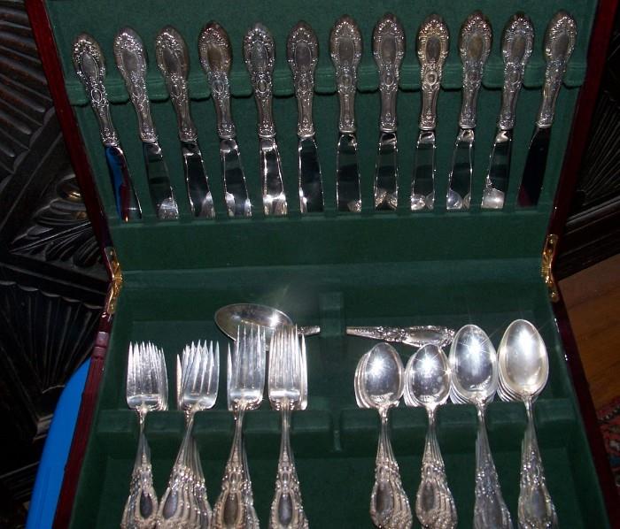 Sterling - Towle "King Richard", 1932 - consists of a place setting for 12 - 84 pieces.  The set comes with a gorgeous silver box.