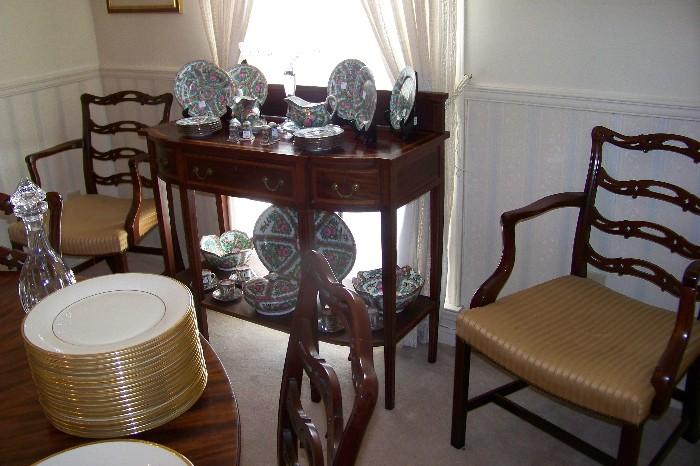 Two of the set of 8 ribbon back chairs.  Also shown is a pretty mahogany, Hepplewhite server with three drawers