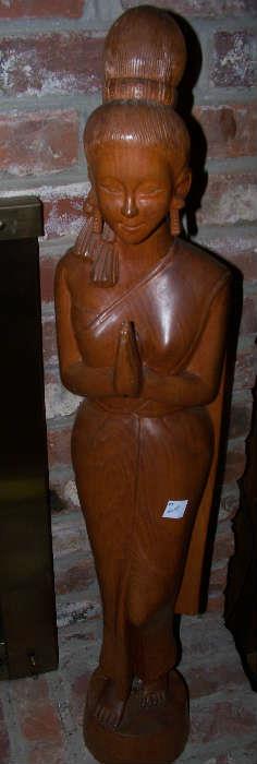 Tall wooden oriental figure