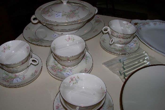 Cups and saucers, serving pieces in Haviland's Apple Blossom