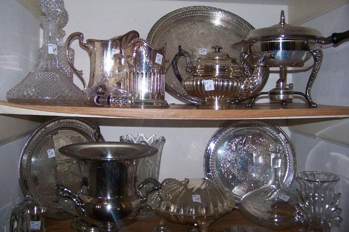 Silverplate, crystal vases and decanters