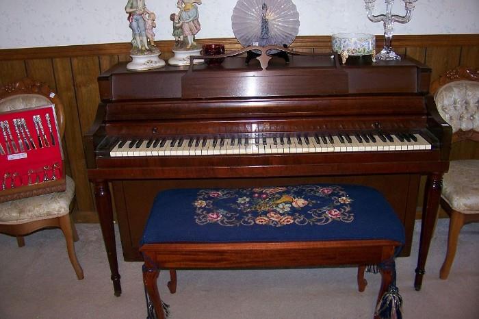 Wurlitzer piano with bench - needlepoint pad on the stool