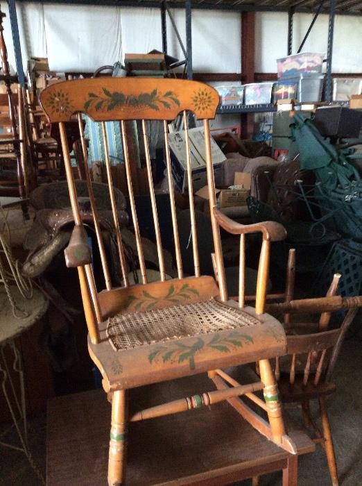 stenciled back cane seat rocking chair. 