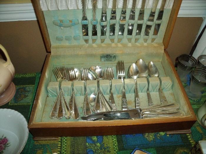 Two sets of flatware