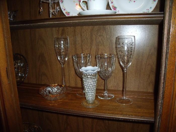Fine wine glasses with Fenton glass vase