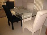 Glass top dinning table with 4 upholstered chairs!