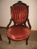 Antique chair - on rollers (one wheel is broke)!
