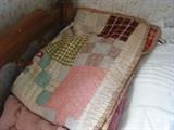 one of many quilts and linens
