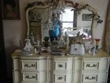 white dresser with ladies decor