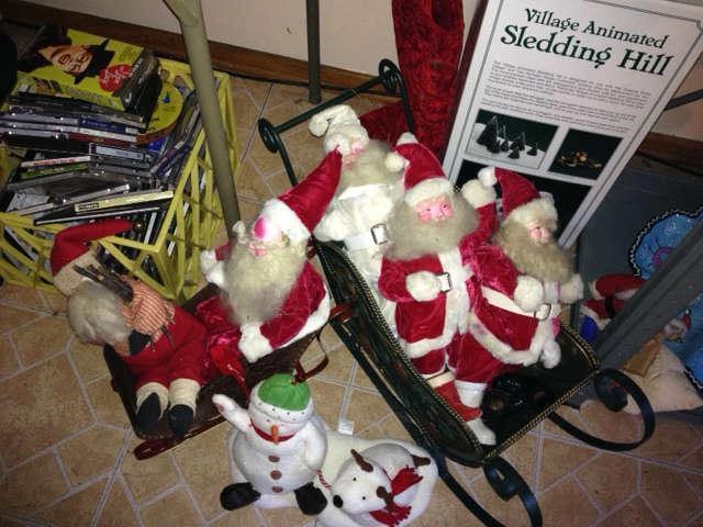some of the santas, records for the phonograph, cd's and movies