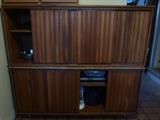 Three pine cabinets (two pictured here stacked on top of each other but there is a third) with sliding door panels and fruitwood finish - in good condition. Third cabinet also in fruitwood with two drawers and sliding panels.