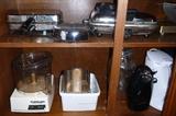 Pizale maker, waffle iron, Cuisinart and its blades, etc., can opener, water kettle and jar with snap on lid.