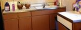 About 10' of white/spun gold Formica counter tops with stainless banding includes sink and faucet and sprayer (the two pieces are pictured).
