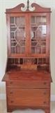 Nice drop front secretary with china cabinet top.