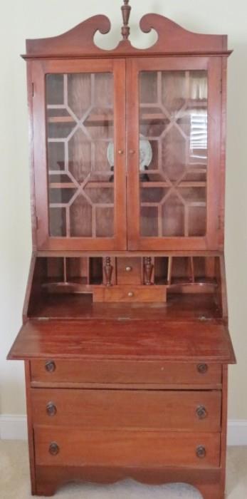 Nice drop front secretary with china cabinet top.