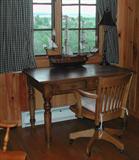 Nice desk and chair with ship model