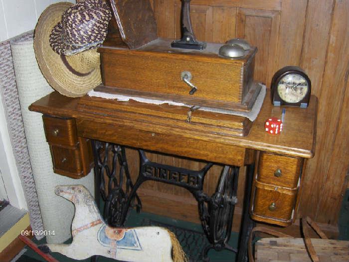 Old sewing machine cabinet only & wall telephone