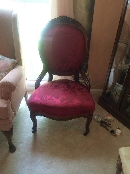 #32 burgundy chair $150