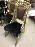 1800's Carved Chairs with couture black mink upholstered seats and designer leopard backs, fancy carved details.  450. each, 2 total