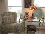 Cozy over stuffed chair with matching pillows, Tiffany style lamp