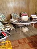 Patio table and rocking chairs, umbrella stand