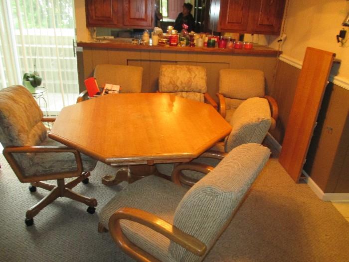 dining room set #1 comes with leaf and 6 chairs on wheels $100