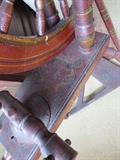 Close Up of Detailed Painting on Spinning Wheel 