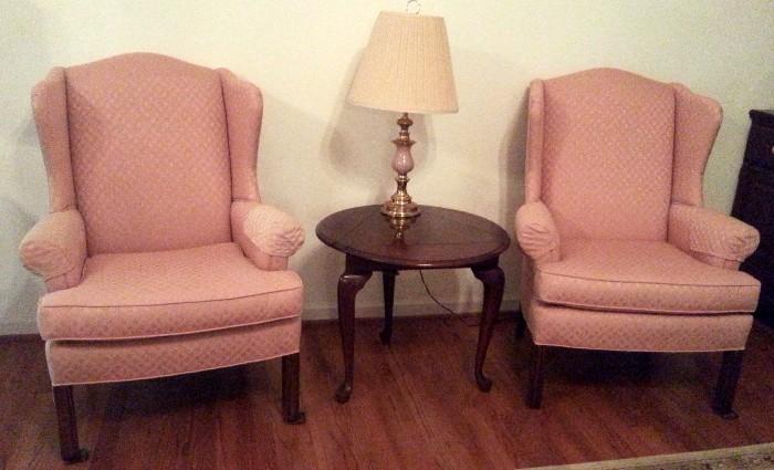 Pair of traditional wing back chairs and a unique occasional table with three drop leafs.