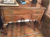 This is a lovely small writing desk. Makes a great accent table, sofa table, dressing table, etc. 