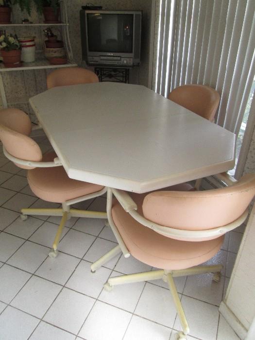 Nice kitchen set with four castered chairs