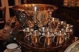 Silver plate punch bowl with matching cups