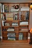 Mid century teak book shelf filled with fantastic art books