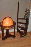 Lighted globe on mahogany stand with library spiral steps