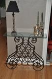 Petite glass and iron side table
