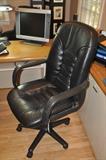 Executives black leather desk chair
