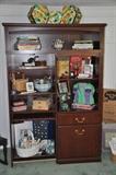 Expandable desk with pull out writing top filled with crafting supplies