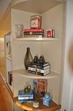 Nice selection of books, candles and home decor in the office