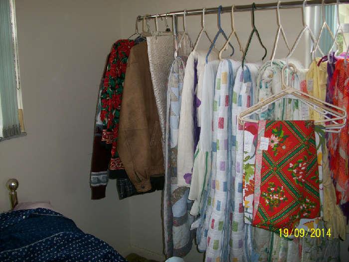 Bedspreads, vintage tableclothes, some clothing