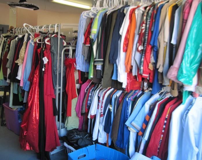 racks and racks of clothes, some with tags, men's and women's