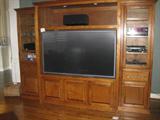 Custom made entertainment center and TV