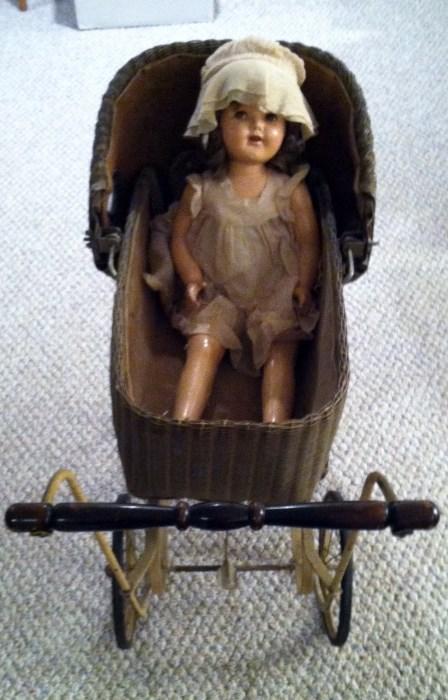 Antique doll and carriage