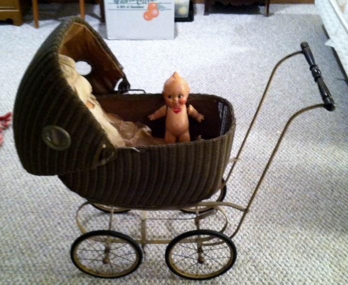 antique carriage and Kewpie doll (needs repair)