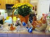 Bird Figurines by Goebel, Art Glass Items, Sitting Hen, Floral is a live plant in Vase