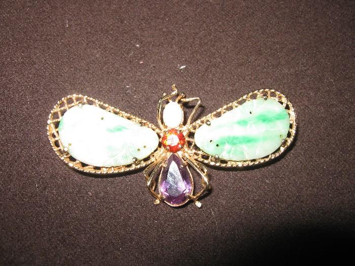 Gold, amethyst, garnet and carved jade pin