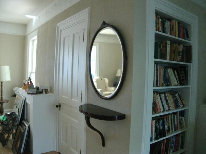 Oval mirror and shelf