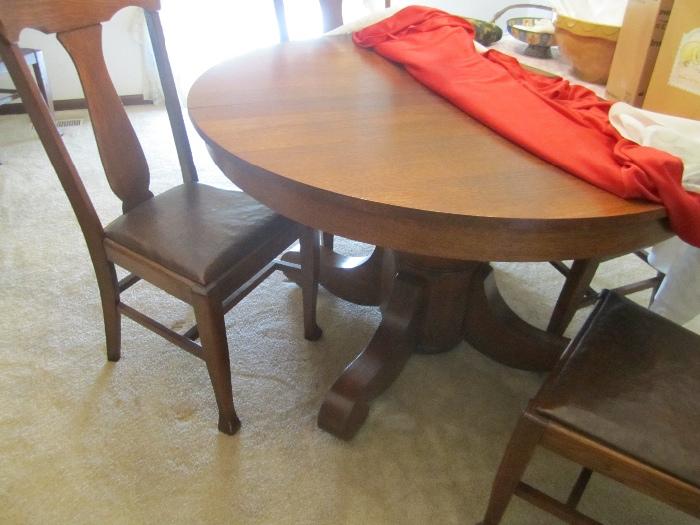 ANTIQUE OAK PEDESTAL TABLE AND CHAIRS