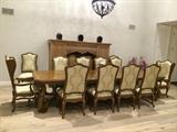 Marge Carson dining table and 12 dining chairs.  Like new, never been used!  Retail price $65,000 Our price $19,000.
