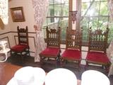 Set of 7 Jacobean carved oak chairs with lion finials
